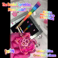 Image 2 of Circus Animal Cookie Furby Clip