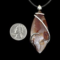 Image 2 of Fire Agate with Sterling Silver Wave Wrap (#39)