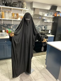 Image 1 of Open overheads