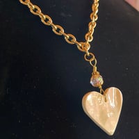 Image 3 of pink conch heart on gold chain