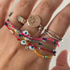 Charm bracelet with gemstones