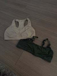 two sports bras (sz meds)