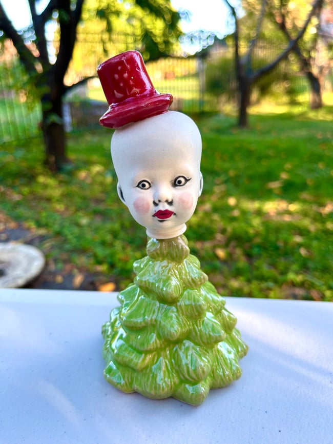 Sweet Faced Tree wtih Red Hat