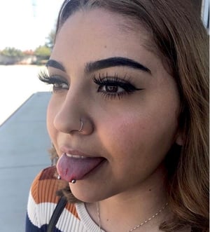 SNAKE EYES TONGUE PIERCING SERVICES