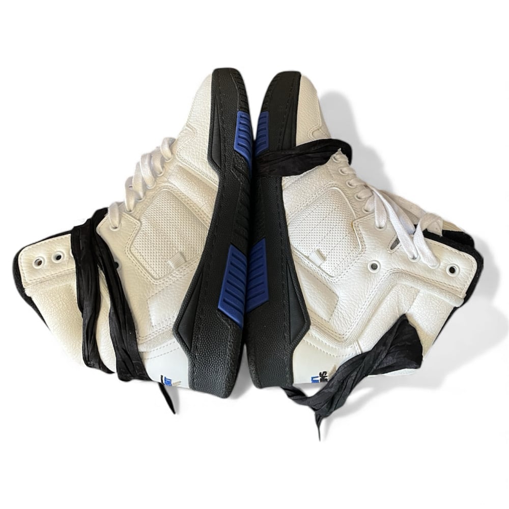 Image of Saint Laurent Cure Leather Trainers