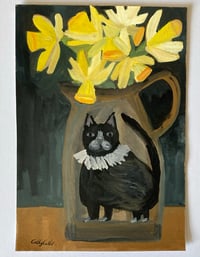 Cat jug with daffodils 