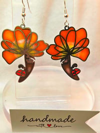 Image 4 of Handcrafted Resin Face with Flower 