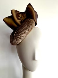Image 1 of Gold button headpiece.