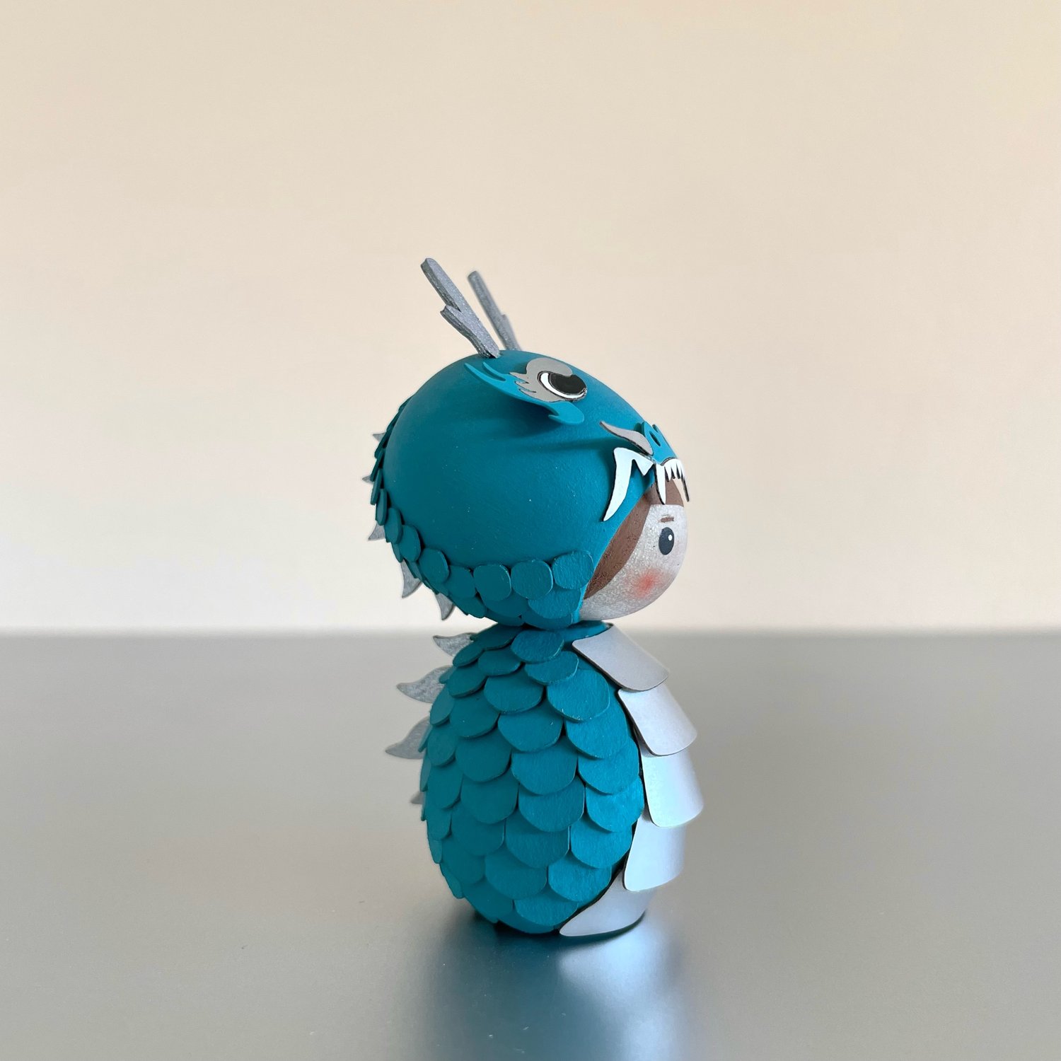 Image of A SURPRISE LISTING - A TEAL/SILVER DORIMU DRAGON