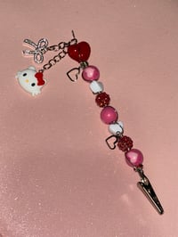 Image 1 of ✨❤️‍🔥red hello kitty clip❤️‍🔥✨