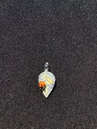Image 1 of Purple Leaf W/ Orange Ladybug pendant 