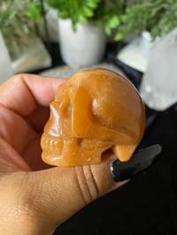 Image 3 of Orange Calcite Skull
