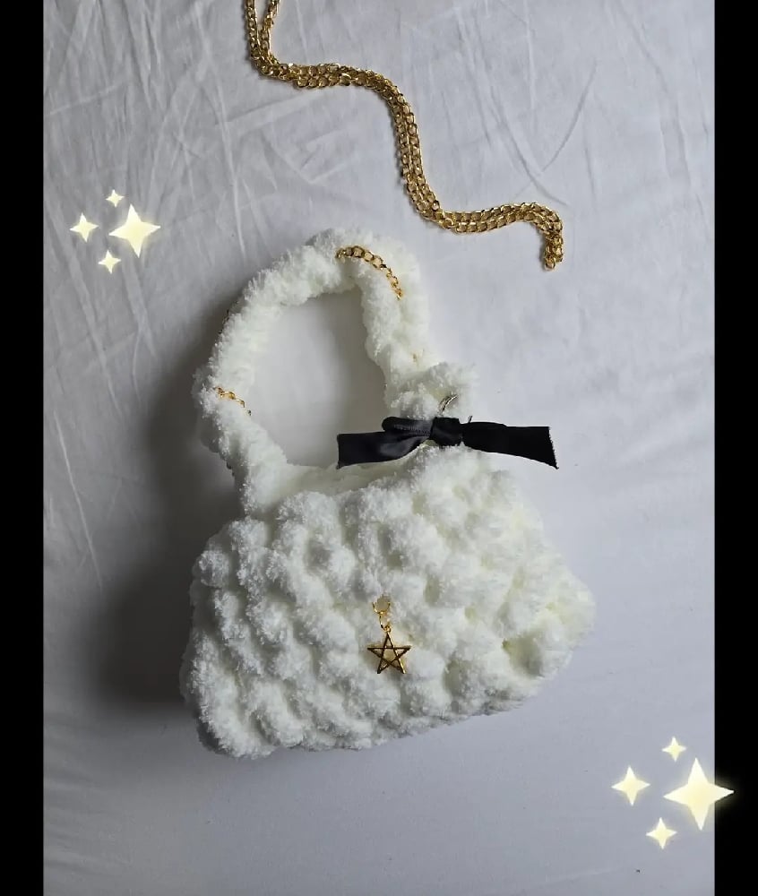 Image of white fluffy crochet handbag