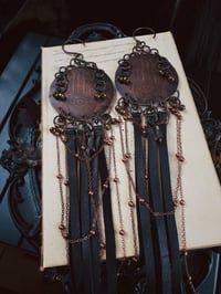 Image 1 of Copper palms and snake hangers 