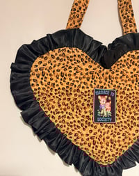 Image 3 of Leopard Print Heart Ruffle Bag – “Menace to Society” Patch