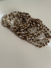 Image 2 of Bronze stacker