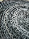 black t-shirt yarn crochet round rug, 2’ diameter