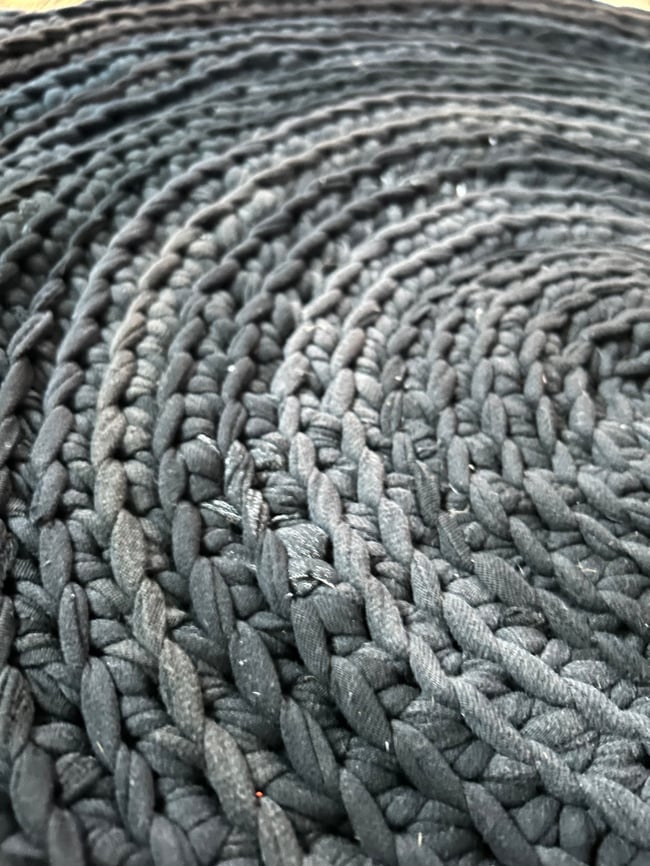 black t-shirt yarn crochet round rug, 2’ diameter