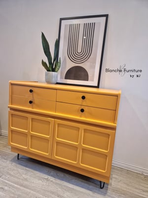 Image of Gorgeous Nathan Sideboard in a Marigold Orange on Black Hairpin legs with Matching handles