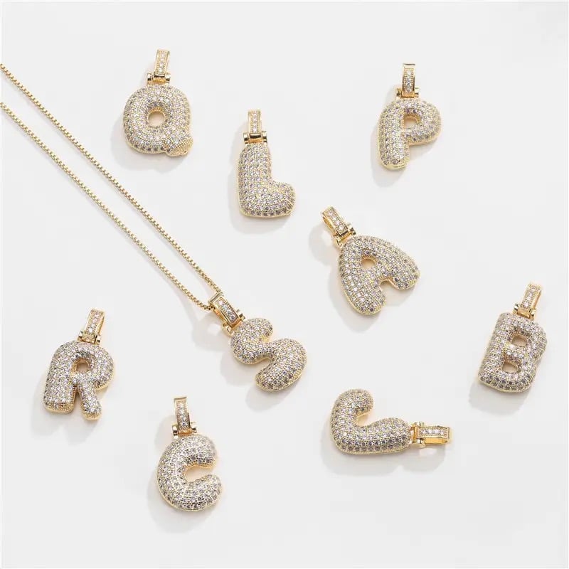 Gold cubic letter necklace 