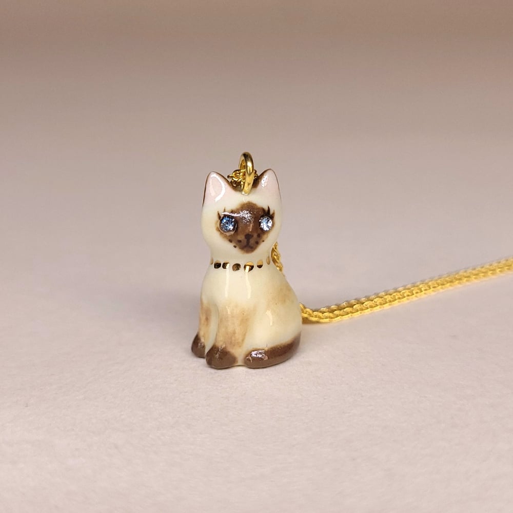 Image of Siamese Porcelain & Gold Vermeil Sitting Kitten Pendant