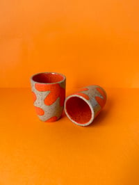 Image 1 of Orange cup