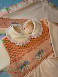 Image 3 of girls peach smocked babygrow 