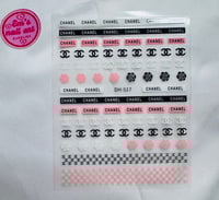 chanel sticker. pink black & white 