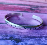 Image 3 of Star and Moon silver stamped cuff bracelet. Heavy celestial sterling bangle. Chunky cosmic cuff.