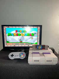 Image 1 of Super Nintendo w/ controller & Super Mario World