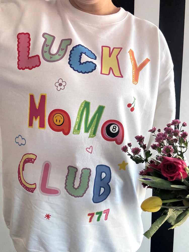 Image of the lucky club tees/sweater 