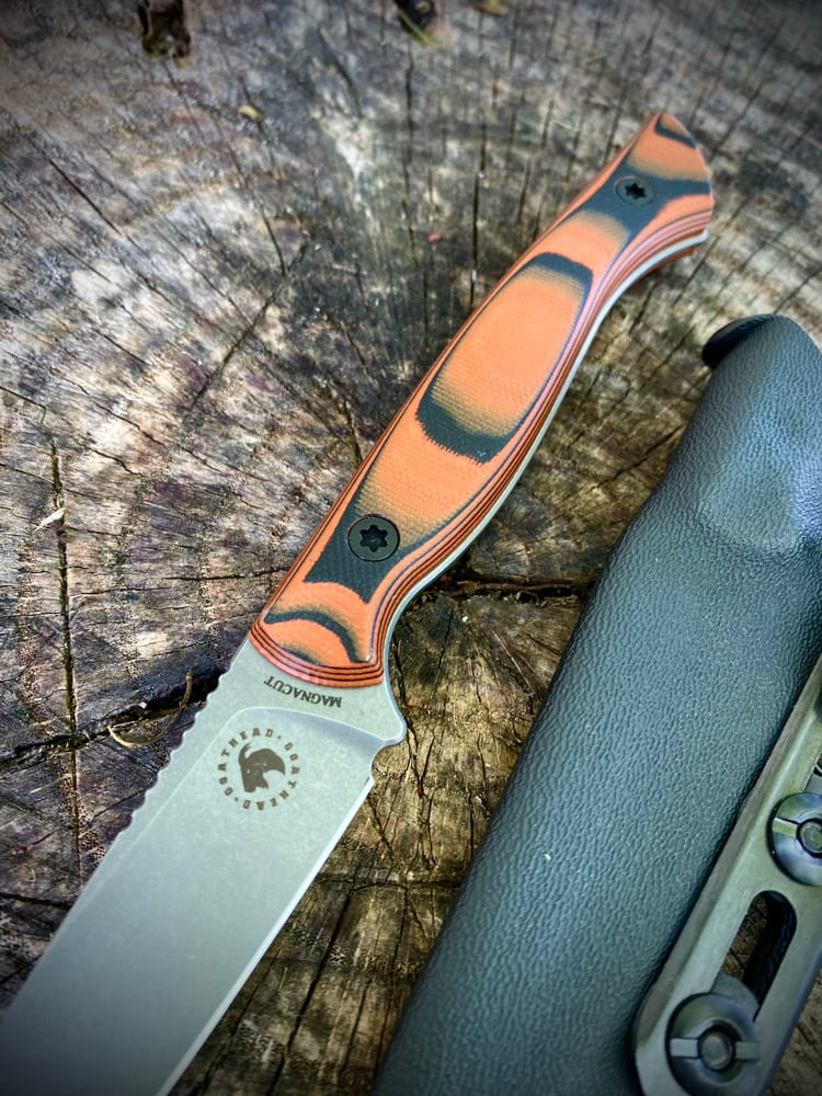 Image of TRAPPER-ORANGE/BLACK G10-MAGNACUT