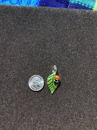 Image 2 of Small Green Leaf W/ Orange Bug Eyed Ladybug pendant 