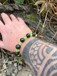 Image 4 of Uranium Glass and Bog oak beads