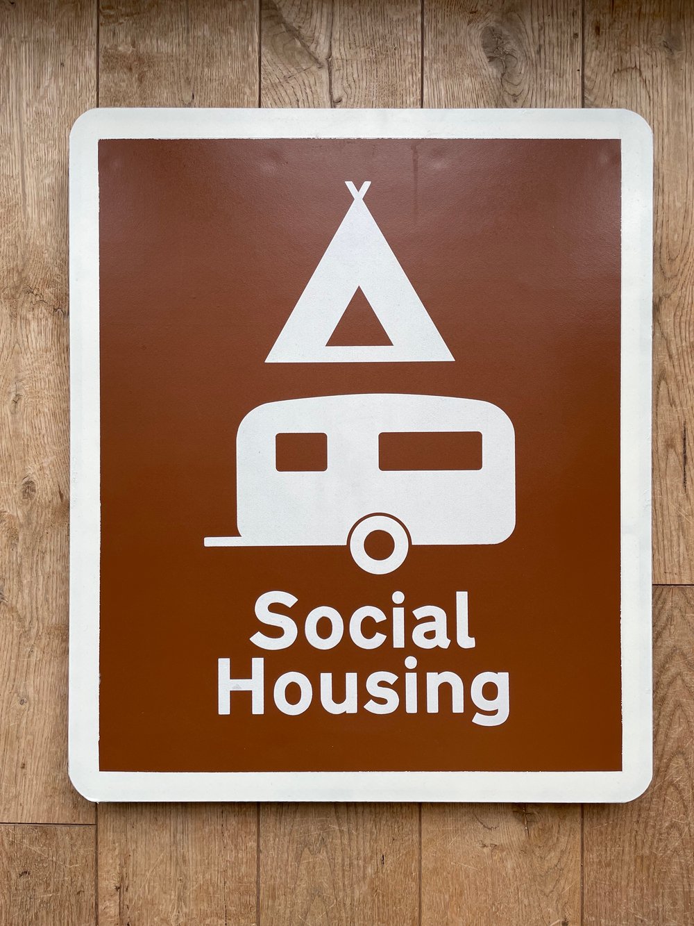 Image of SOCIAL HOUSING METAL ROAD SIGN
