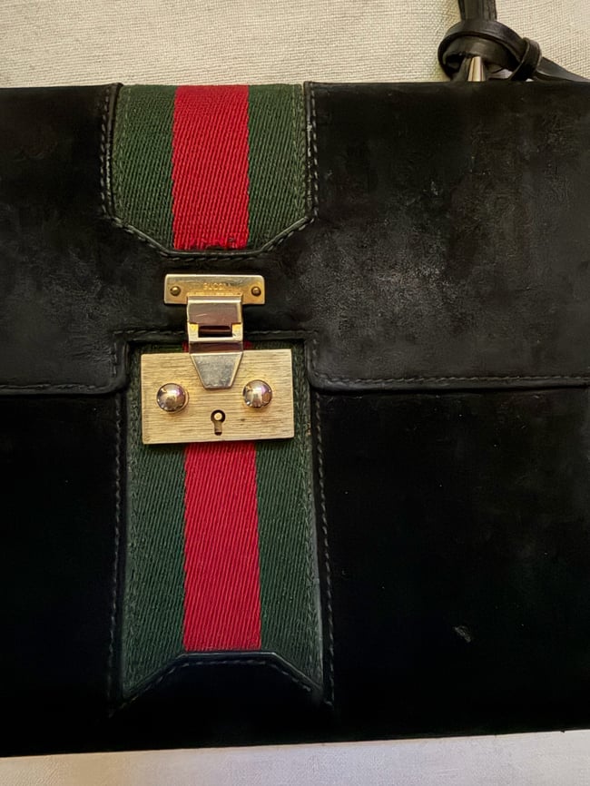 1970s Gucci italian leather handbag w lock and key