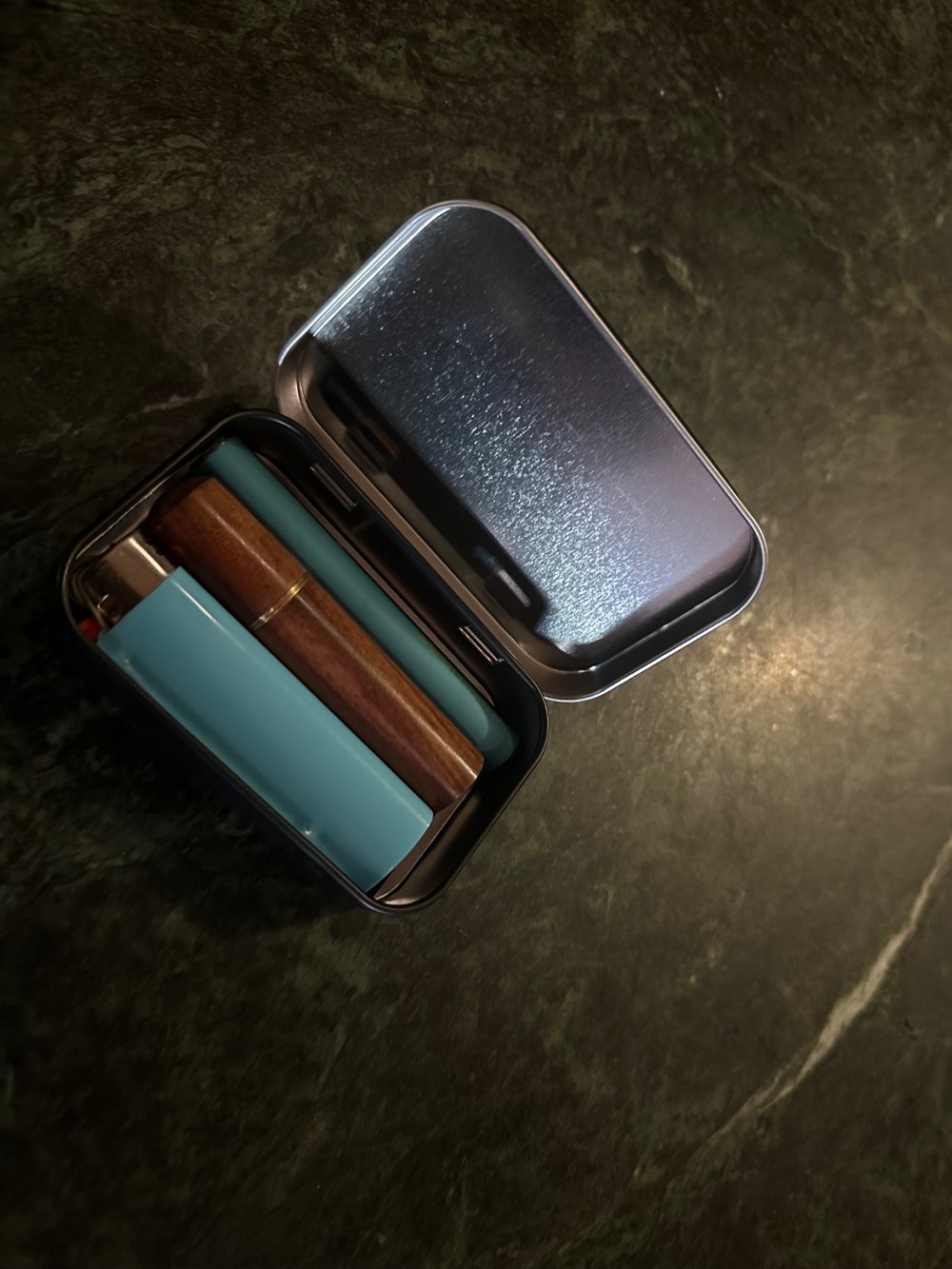 The Hidden Loom stash/EDC tin