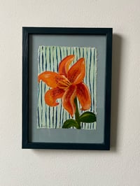 Image 1 of Small orange lily 