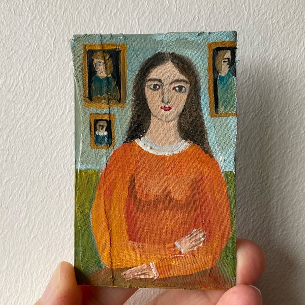 Image of Woman in orange dress - tiny portrait 