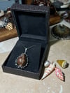 Spiked Snakehead Cowrie Pendant 