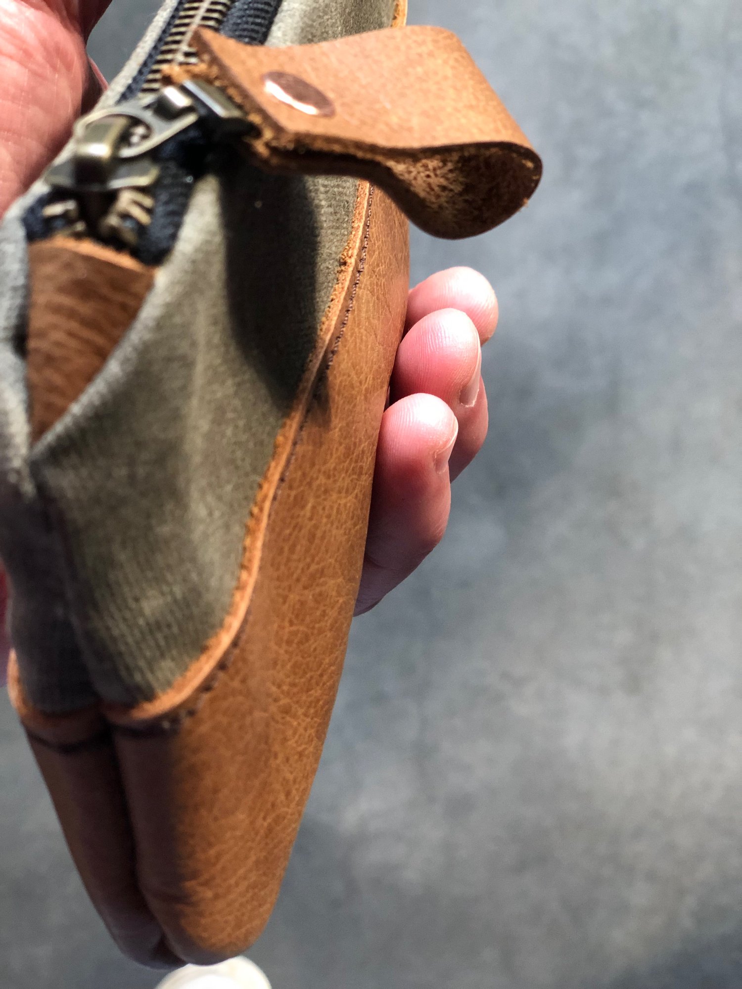 Image of pencil case made from field tan waxed canvas and oiled leather