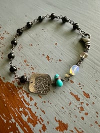 Image 9 of faceted gemstone and sterling silver medallion bracelet