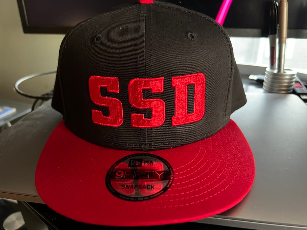 Black & Red New Era Flat Bill SnapBack Solid Red SSD Logo hat