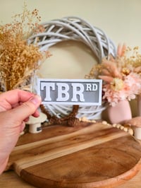 Image 2 of Bookshelf street signs decor