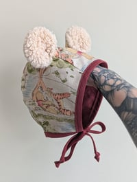 Image 2 of Winnie The Pooh baby bonnet with bear ears