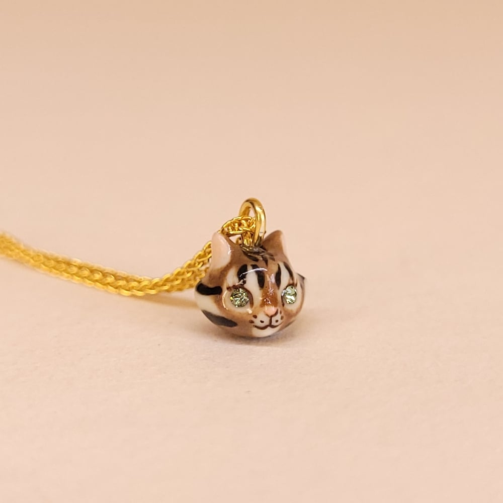 Image of Brown Tabby Porcelain & Gold Vermeil Teeny Tiny Cat Pendant