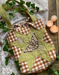 Image 1 of luna quilted star bag