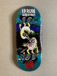 Image 1 of Merged Curb Killer FB Deck