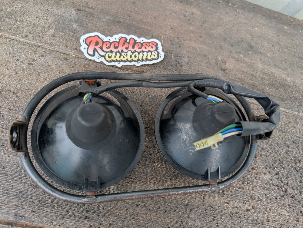 **GARAGE SALE ITEM Zoomer Headlights and Ring 