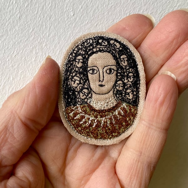 Image of Portrait of a woman in brown and green - smaller embroidery brooch 